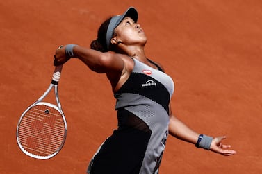 FILE PHOTO: Tennis - French Open - Roland Garros, Paris, France - May 30, 2021 Japan's Naomi Osaka in action during her first round match against Romania's Patricia Maria Tig REUTERS/Christian Hartmann/File Photo