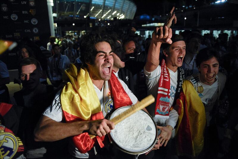Real Madrid supporters celebrate in Kiev, Ukraine. Andrew Kravchenko / AP Photo
