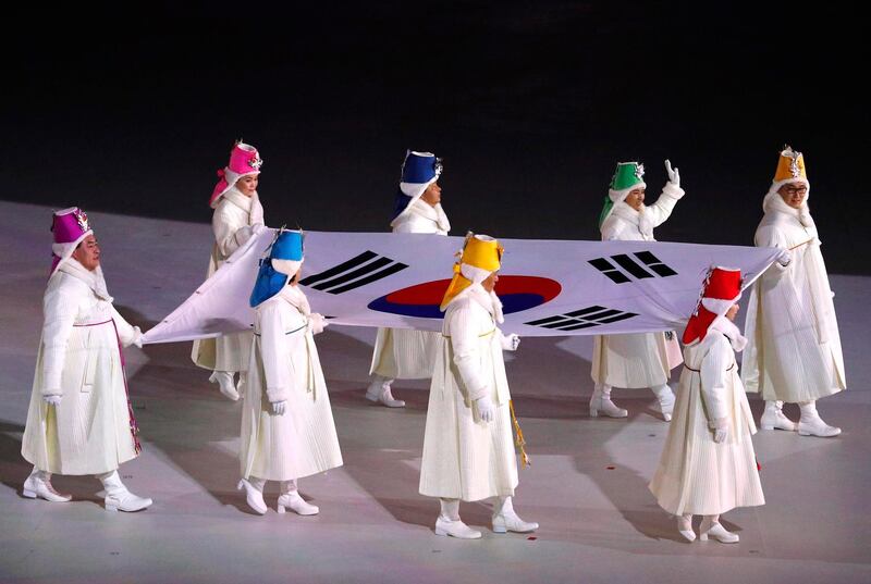 The South Korean flag is paraded during the opening ceremony. Phil Noble / Reuters
