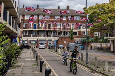 British flags are displayed in a housing estate in London as the nation prepares to celebrate the queen's Platinum Jubilee. Getty Images