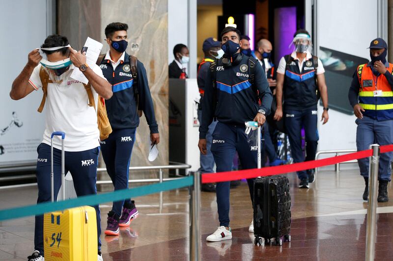 Shreyas Iyer and Mohammed Siraj with the India team at the OR Tambo International Airport in Johannesburg for their tour of South Africa. AFP