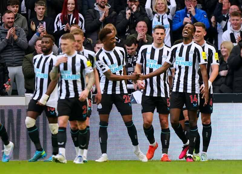 Newcastle's Alexander Isak, second right, celebrates after scoring. PA