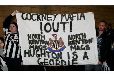 Newcastle United fans make their feelings known about Mike Ashley, the club owner. Mark Thompson / Getty Images