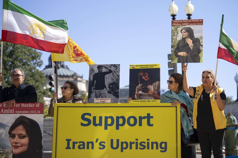 Iranian Americans rally in support of the Iranian resistance movement and to denounce the death of Mahsa Amini, on Capitol Hill in Washington DC on September 28. AFP