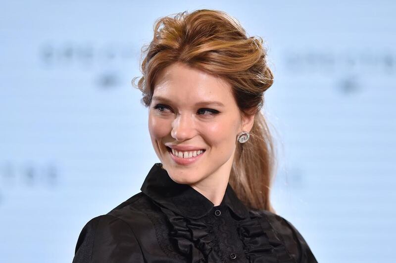 French actress Léa Seydoux sports a pair of Chopard diamond earrings during the announcement of the new James Bond film, Spectre. (Courtesy of AFP PHOTO / BEN STANSALL)

