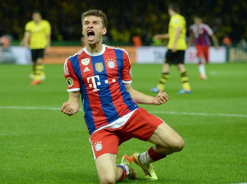 Bayern Munich midfielder Thomas Muller celebrates scoring the second goal during extra time of the German Cup final on Saturday as Bayern went on to win 2-0. Christof Stache / AFP / May 17, 2014
