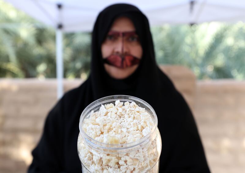 Hessa Umm Khalid with her dry yoghurt, which is traditionally made for the arid climate, at the Saturday Market