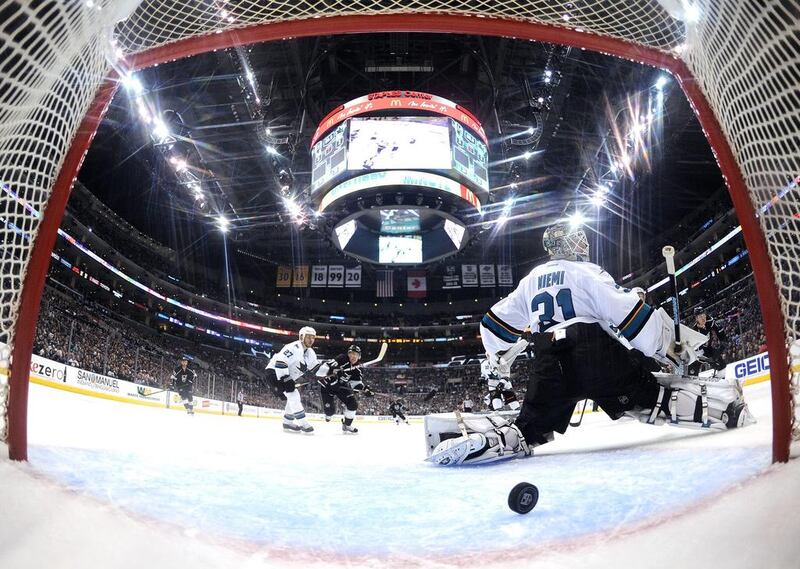 San Jose’s Antti Niemi, right, has seen too many pucks go past him in the last two games. Harry How / Getty Images

