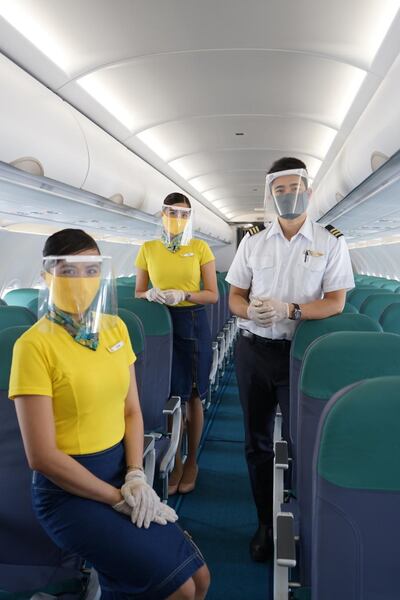 All Cebu Pacific crew must wear masks, visors and gloves on any flight. Courtesy Cebu Pacific