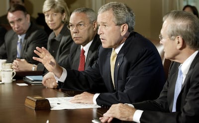 Then US president George W Bush meets his cabinet in the White House in Washington in June 2004. Reuters