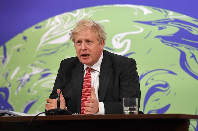 Britain's Prime Minister Boris Johnson speaks during the opening session of the virtual US Leaders’ Summit on Climate from the Downing Street Briefing Room in central London on April 22, 2021. / AFP / POOL / JUSTIN TALLIS
