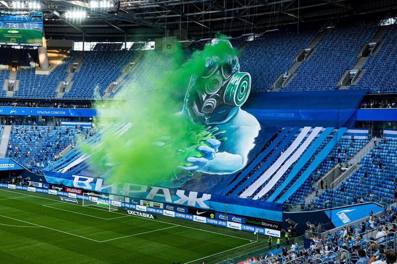 Zenit fans' tifo transformed from a man holding a Covid-19 virus to holding a football during the Russian Premier League match against Krylia Sovetov Samara at the Gazprom Arena in St.Petersburg. Courtesy FC Zenit in English / @fczenit_en