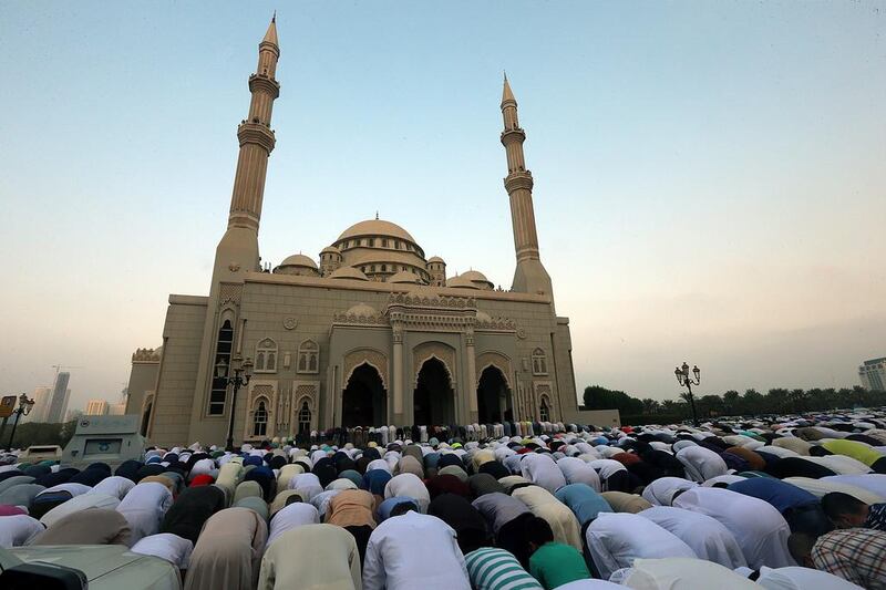 People offer Eid prayers at Al Noor Mosque in Sharjah. Satish Kumar / The National