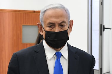 Israeli Prime Minister Benjamin Netanyahu looks on as he arrives for a hearing in his corruption trial at Jerusalem's District Court, on February 8, 2021. Reuters