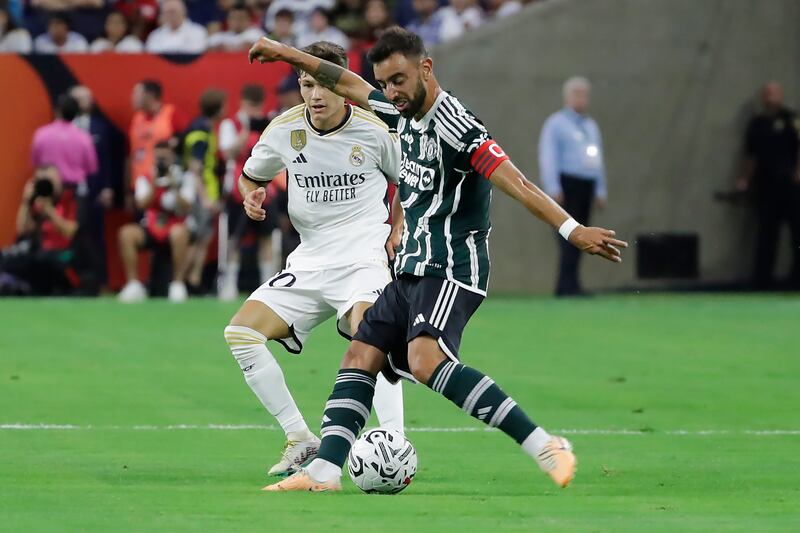 Bruno Fernandes 7 - Played wider than normal – and longer than any of the other outfield starters. One of the few to get a grip on the pace of Vinicius, United’s captain showed the variety to his game with flicks, runs and crossfield balls. His frustration earned him a yellow on 80 minutes. Came close to scoring on 88. AP Photo