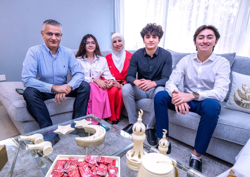 The Yacoub family. From left, Mustafa, Celina, Sajida, Zaid and Jad. Photos by: Victor Besa / The National