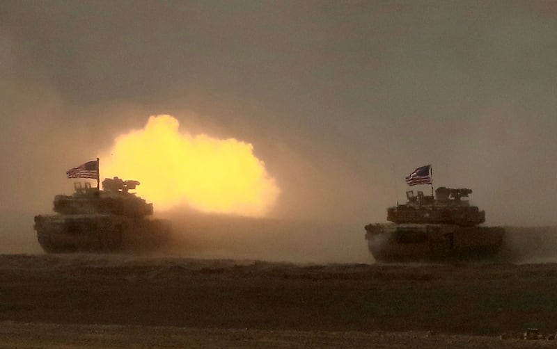 US tanks in action in Al Zarqa governorate, about 85km north-east of Amman. AFP