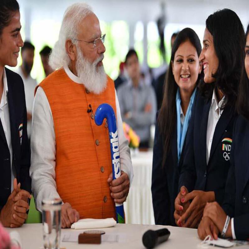 The signatures of the entire Indian hockey team run along the body of a hockey stick for sale. Courtesy PM Mementos.