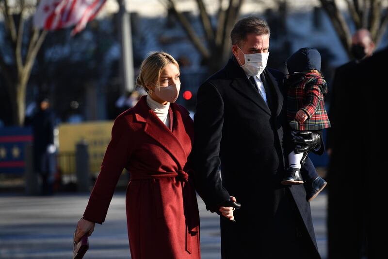 Hunter Biden and his wife Melissa Cohen, with their son, Beau Biden, after the inauguration. AFP