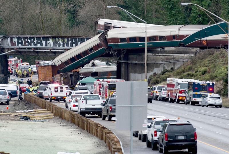 The scene of a portion of the Interstate I-5 highway after an Amtrak high-speed train derailed from an overpass near the city of Tacoma, Washington state. Kathryn Elsesser / AFP Photo