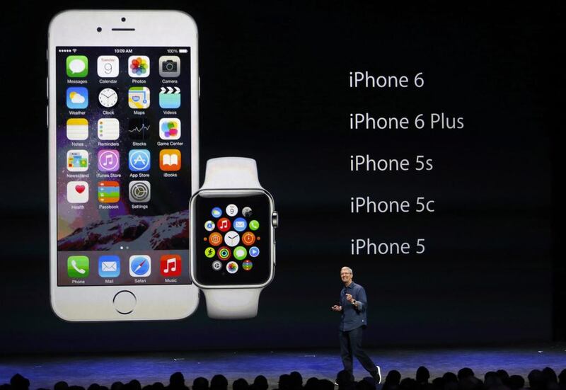 Apple CEO Tim Cook introduces the new Apple Watch and iPhone 6 and 6 Plus. Apple is now working on new hansdsets. Monica Davey / EPA