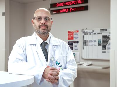 Dr Ayman Ahmed, critical care specialist at Salma Rehabilitation Hospital, at Sheikh Khalifa Medical City, said third-hand smoke was an often overlooked health risk. Victor Besa / The National