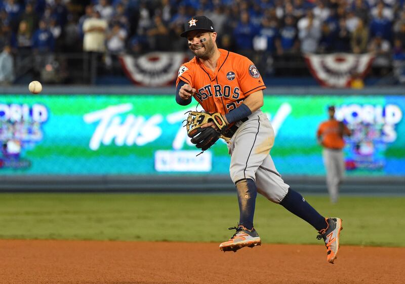 Houston Astros' second baseman Jose Altuve throws to first base in the ninth inning for the final out against the Los Angeles Dodgers in Game 7 at Dodger Stadium. Jayne Kamin-Oncea / Reuters