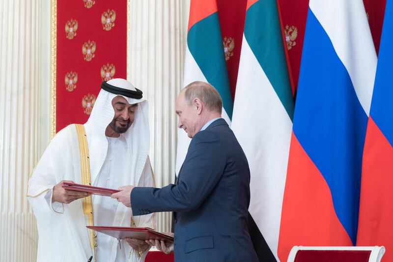 MOSCOW, RUSSIA - June 01, 2018: HH Sheikh Mohamed bin Zayed Al Nahyan, Crown Prince of Abu Dhabi and Deputy Supreme Commander of the UAE Armed Forces (L) and  HE Vladimir Putin Vladimirovich, President of Russia (R) exchange documents after the signing of a memorandum of understanding, at the Kremlin Palace.

( Rashed Al Mansoori / Crown Prince Court - Abu Dhabi )
---