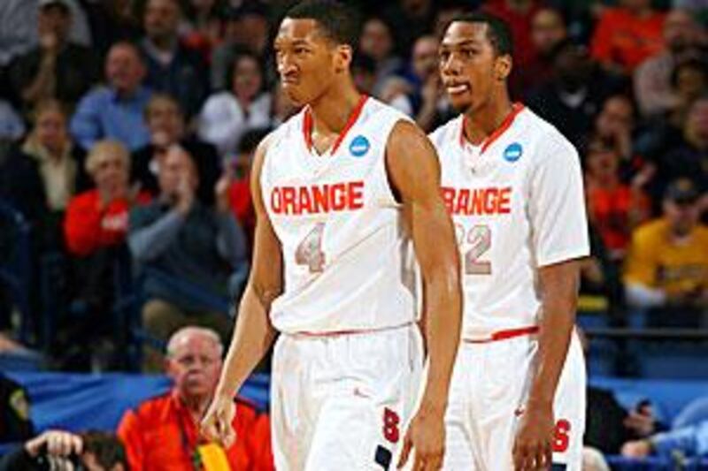 Wes Johnson, left, and Kris Joseph of Syracuse were instrumental in Syracuse's win over Gonzaga on Sunday.