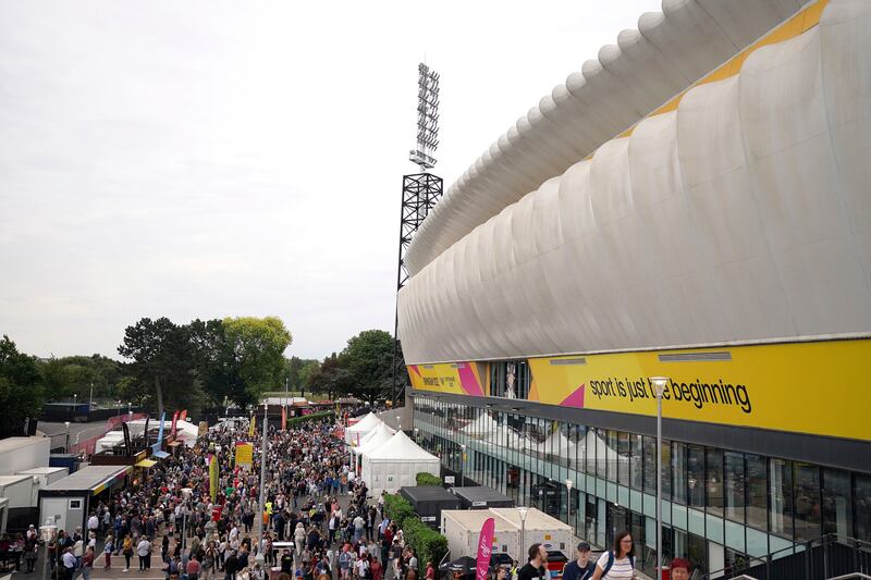 Spectators arrive before the opening ceremony at Alexander Stadium. AP 