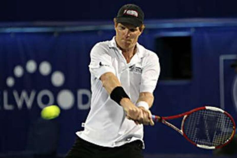 Jim Courier hits a shot during his straight sets victory over Stefan Edberg in Dubai.