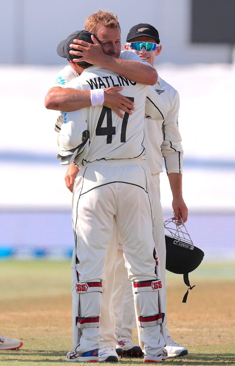 New Zealand's Neil Wagner hugs teammate and wicketkeeper BJ Watling. AFP