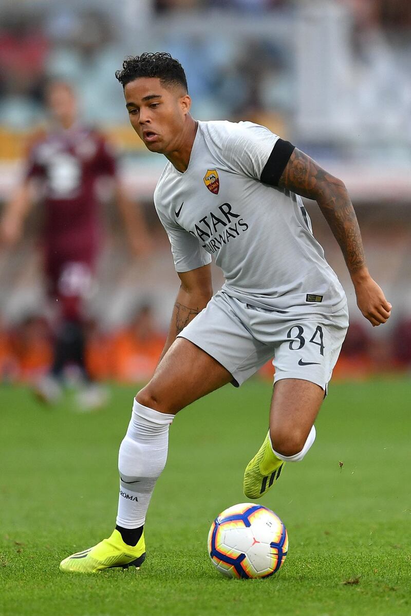 TURIN, ITALY - AUGUST 19: Justin Kluivert of AS Roma controls the ball during the Serie A match between Torino FC and AS Roma at Stadio Olimpico di Torino on August 19, 2018 in Turin, Italy.  (Photo by Valerio Pennicino/Getty Images)