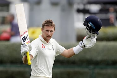 Joe Root salutes the crowd in celebration after reaching his double century against New Zealand in December. AP Photo