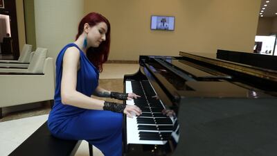 Pianist Elenora Borisova plays for medics and patients at Burjeel Hospital in Abu Dhabi. Courtesy - VPS Healthcare