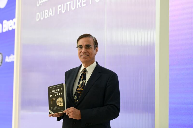 Dr Jose Cordeiro with his book on immortality called 'The Death of Death'.