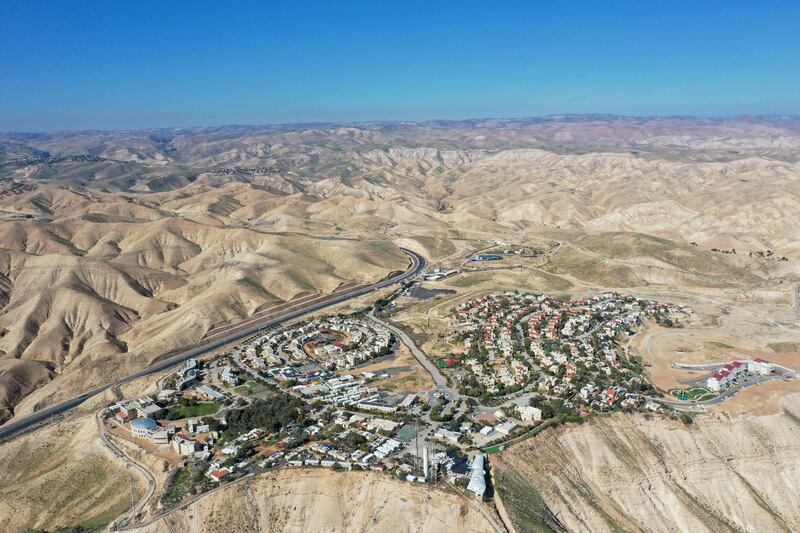 FILE - This Jan. 26, 2020, file photo, shows the view of the West Bank Jewish settlement of Mitzpe Yeriho. As President Donald Trump presented a Mideast plan favorable to Israel, Prime Minister Benjamin Netanyahu on Tuesday, Jan. 28, announced plans to move ahead with the potentially explosive annexation of large parts of the occupied West Bank, including dozens of Jewish settlements. (AP Photo/Oded Balilty, File)