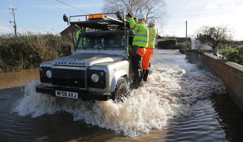 A Land Rover negotiating floodwaters on the Somerset Levels in 2014