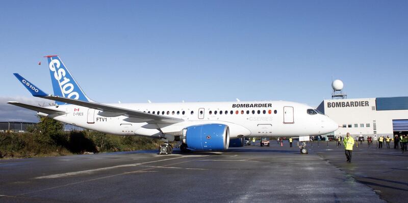 (FILES) In this file photo taken on September 16, 2013 shows the bombardier aircraft CSeries on the tarmac in Mirabel, Quebec. 
A bipartisan trade panel on January 26, 2018 blocked the US government's decision last year to impose nearly 300 percent punitive tariffs on airplanes manufactured by Canada's Bombardier in a dispute that has inflamed relations with Ottawa.The US International Trade Commission voted 4-0 that there was no injury to US manufacturers, which effectively forces President Donald Trump's Commerce Department to reverse course on the retaliatory countermeasures designed to protect Boeing.
 / AFP PHOTO / Clement Sabourin