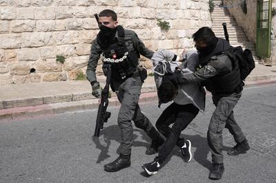 Israeli police detain a Palestinian man ahead of Friday prayers at Al Aqsa Mosque on March 1. AP