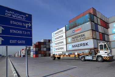 A terminal tractor passes in front of a stock yard of DP World's Terminal 2 at Jebel Ali Port in Dubai. The emirate's non-oil trade surged in value and volume in the first nine months of 2019. Reuters. 