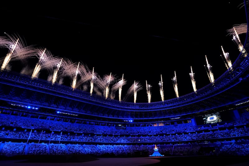 Fireworks light up the sky during the closing ceremony at the Olympic Stadium.