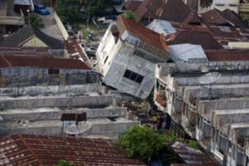 A damaged building is seen on  October 3, 2009 in Padang, Indonesia. Wednesday's 7.6 magnitude temblor devastated a stretch of more than 100 kilometres along the western coast of Sumatra island.