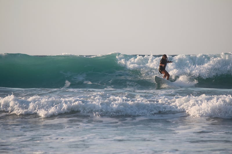 Leila Aziz, 16, learnt to surf over the past four years and is now a Surf Camp Egypt instructor. Photo: Tulip Afifi