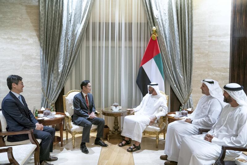 ABU DHABI, UNITED ARAB EMIRATES - February 11, 2019: HH Sheikh Mohamed bin Zayed Al Nahyan, Crown Prince of Abu Dhabi and Deputy Supreme Commander of the UAE Armed Forces (3rd R), meets with Jae-Yong Lee, Vice Chairman of Samsung Electronics South Korea (2nd L), at Al Shati Palace. Seen with HE Mohamed Mubarak Al Mazrouei, Undersecretary of the Crown Prince Court of Abu Dhabi (R) and HE Khaldoon Khalifa Al Mubarak, CEO and Managing Director Mubadala, Chairman of the Abu Dhabi Executive Affairs Authority and Abu Dhabi Executive Council Member (2nd R).

( Mohamed Al Hammadi / Ministry of Presidential Affairs )
---