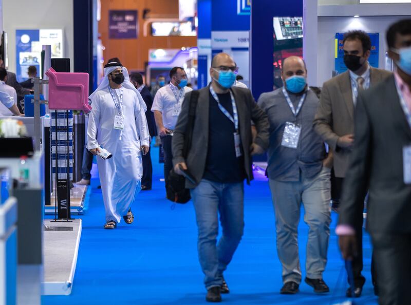 Visitors to Adipec on the first day of the event.