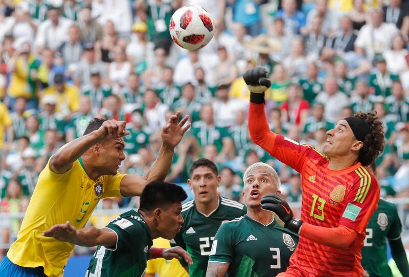 Goalkeeper Guillermo Ochoa, right, of Mexico in action. Robert Ghement / EPA