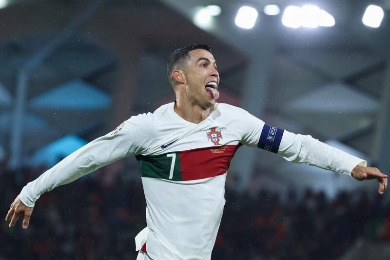 Portugal forward Cristiano Ronaldo celebrates after scoring his team's first goal. AFP