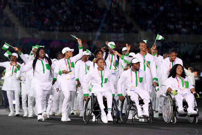 Team Nigeria acknowledge fans as they walk out into the stadium. Getty Images