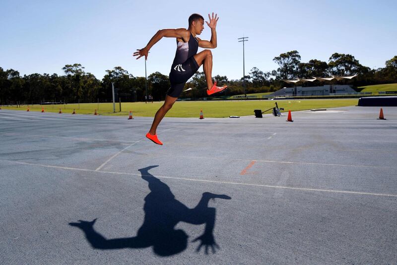 French athlete Sasha Zhoya warming up during a training session in Perth, Australia. AFP